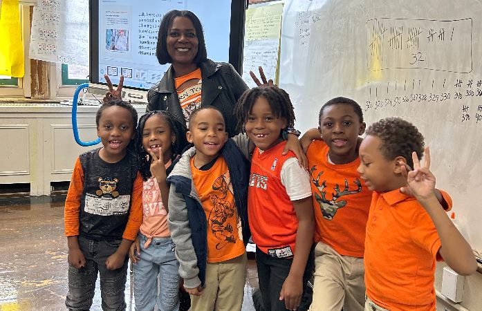 teacher with group of her students